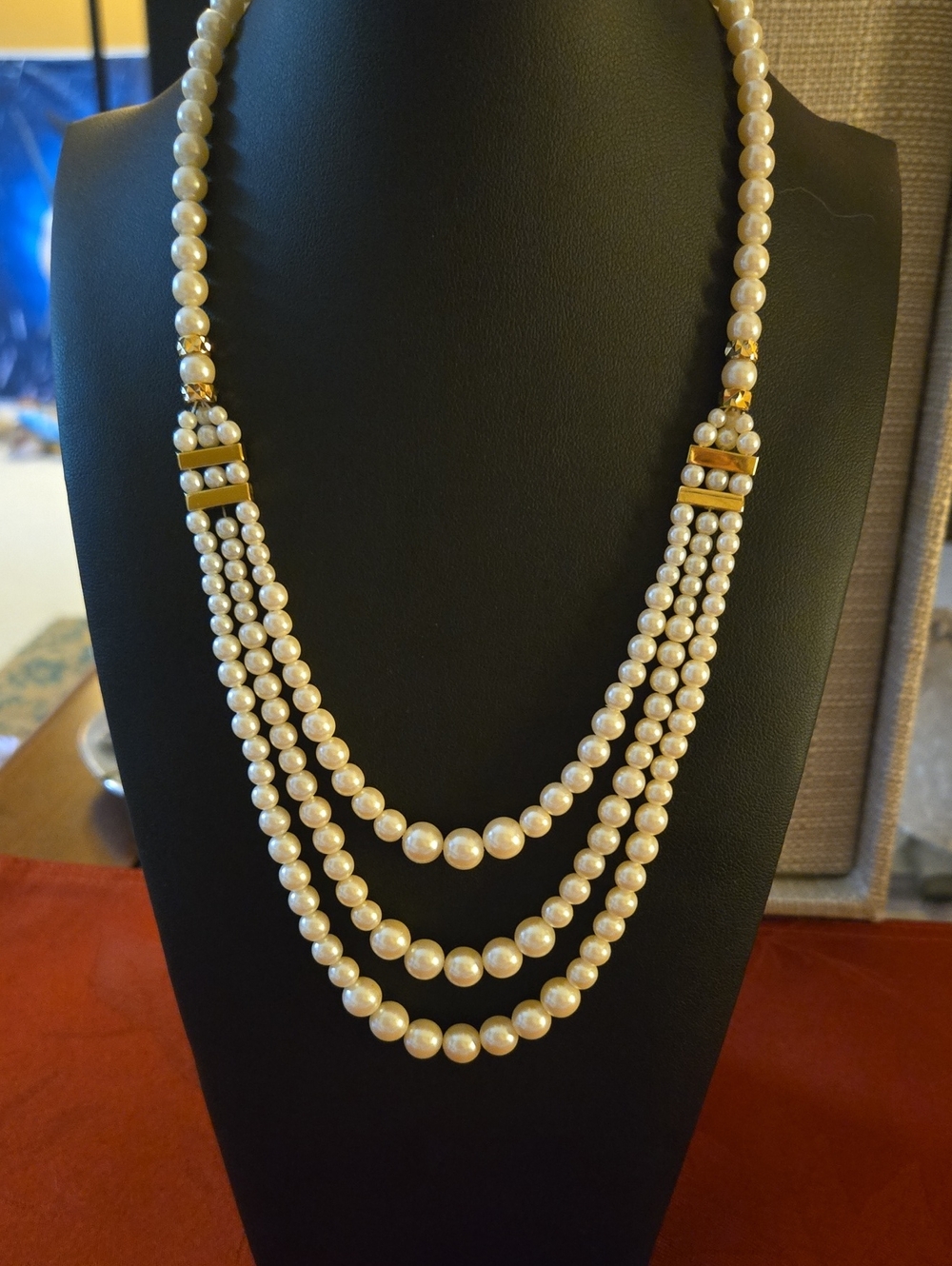 Classic Triple-Strand Pearl Necklace With Gold Accents